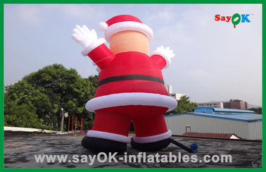 Kundenspezifisches rotes aufblasbares Weihnachten Weihnachtsmann mit Brot-aufblasbarer Zeichentrickfilm-Figur