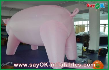 Riesige rosa aufblasbare Schwein-Karikatur besonders angefertigt für Werbung